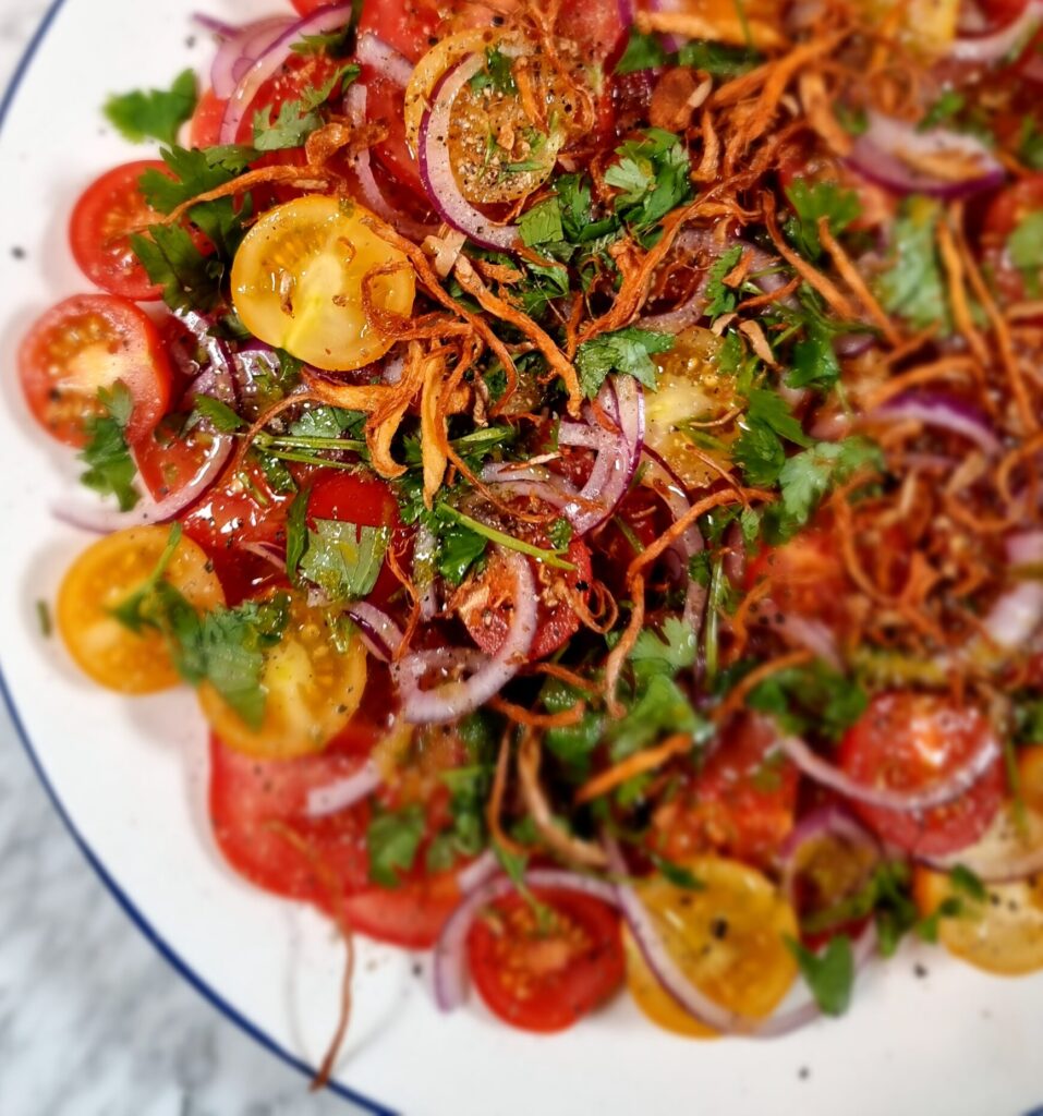 Tomato Salad With A Ginger, Garlic, Lime and Fish Sauce Dressing