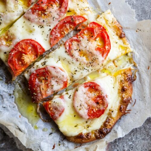 Baked Mahón Cheese Flatbread with Tomato and Olive Oil