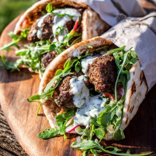 Lamb kofta skewers with flatbreads and tahini drizzle