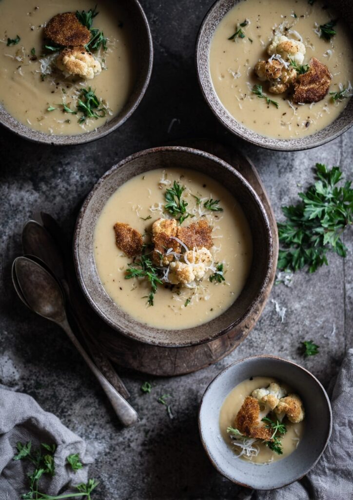 Roasted Cauliflower and Garlic Soup with Parmesan Crisp