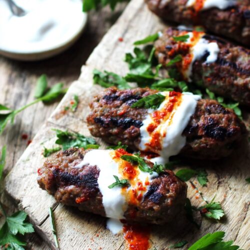 Spicy lamb koftas with harissa yoghurt