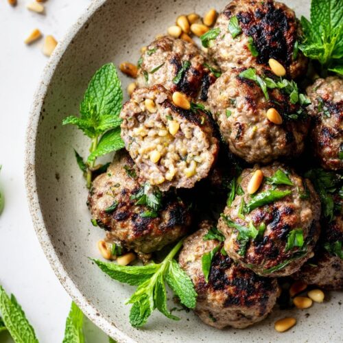 Stuffed lamb koftas with pine nuts and herbs